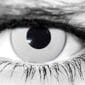 Person wearing white-out Prescription Zombie Contacts with special FX makeup